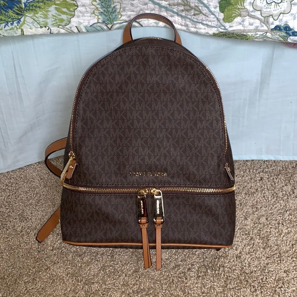 Michael Kors Handbags - NWT Authentic Michael Kors Rhea Backpack
